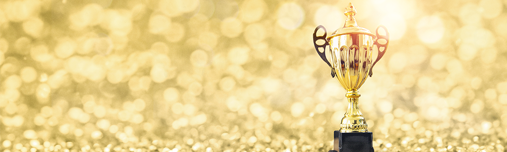 Photo of a trophee in a gold setting